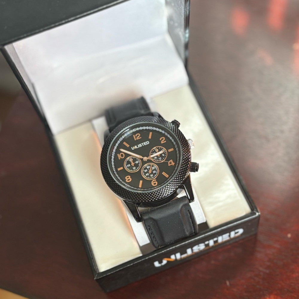 Like new Unlisted by Kenneth Cole mens watch.